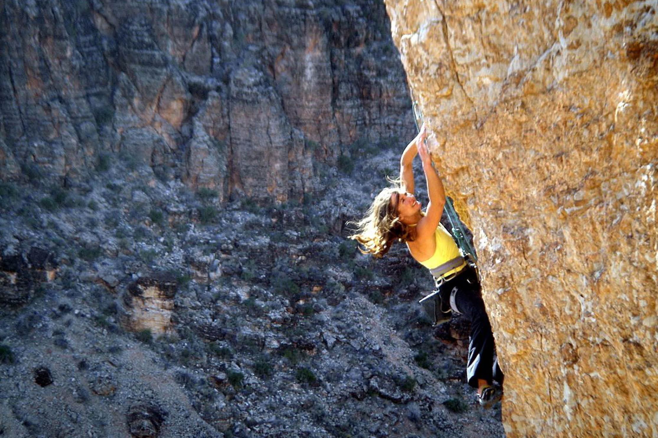 women rock climbing photo