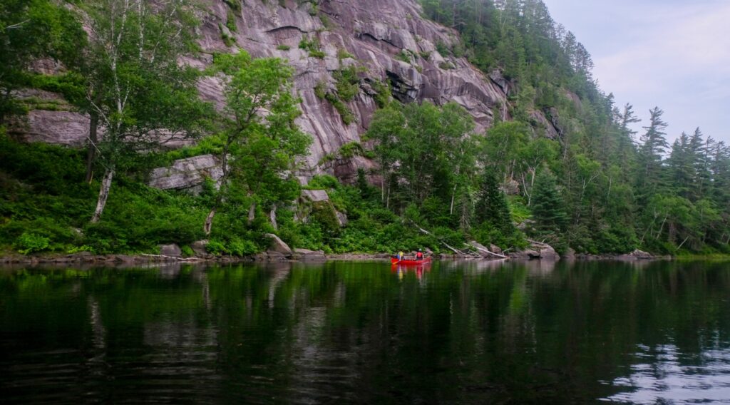 Campsite beside a Class V rapid on the Dumoine River