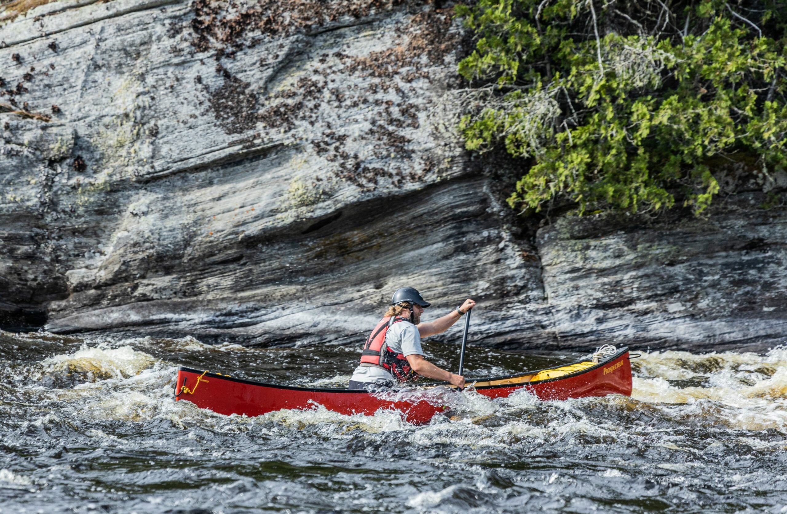 Person canoe camping on the Dumoine River