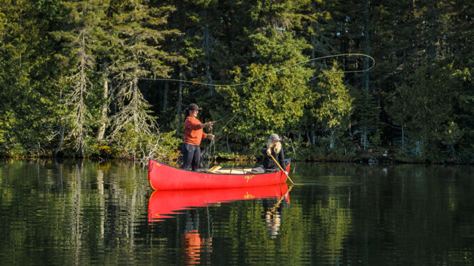 2 girls fly fishing