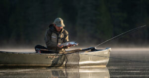 Man fly fishing trout