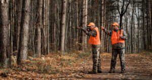 Men hunting during the fall