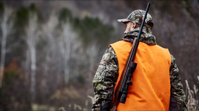 Hunter with a hunting rifle