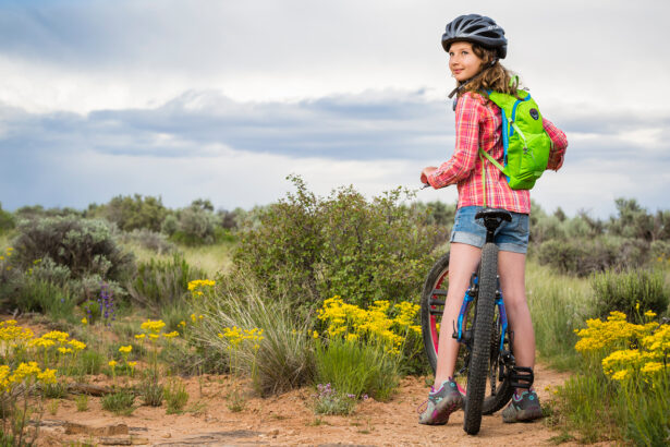 Little girl outside on a bike