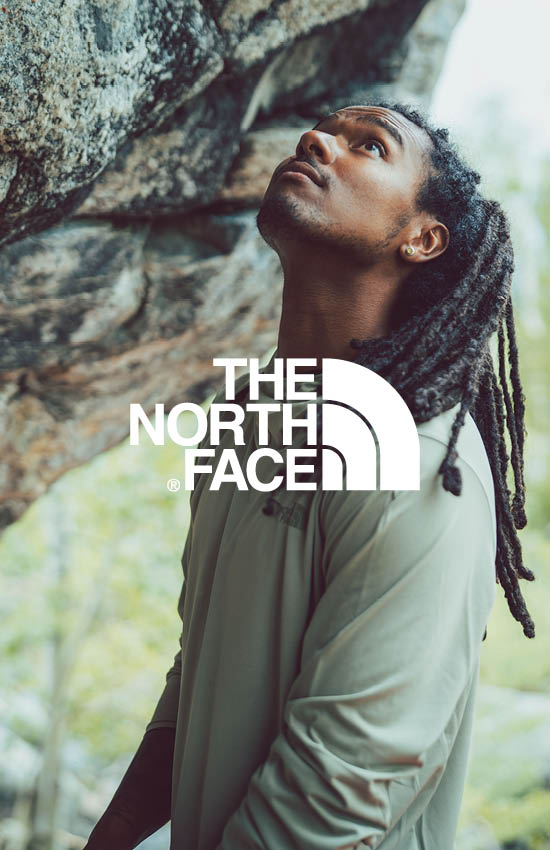 Man who looks up and wears The North Face activewear