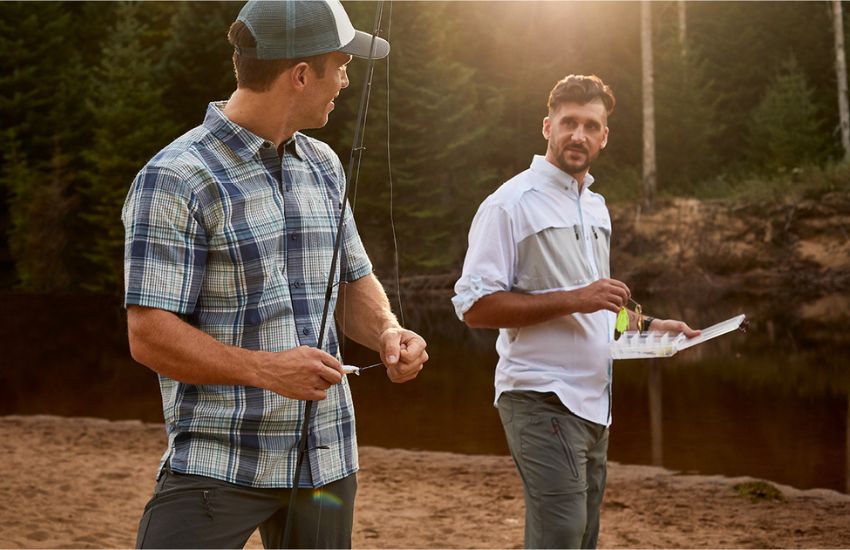 two men getting ready to go fishing