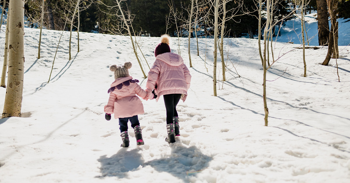 Two kids in a winter landscape