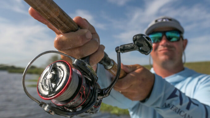 fishing rod held by an angler