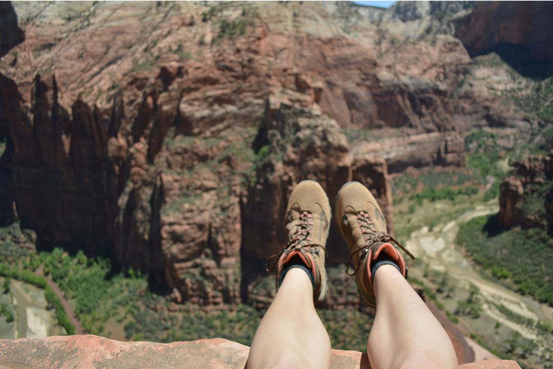 a person wearing the best hiking boots on a mountain trail